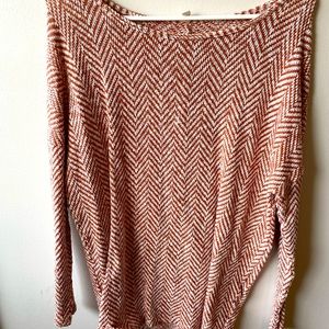 Never worn. Cream and rust orange chevron knitted long sleeve